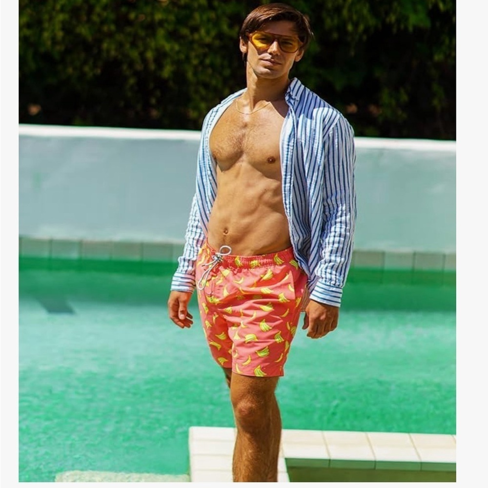 New XXL Men’s Board Shorts
Banana pattern. 
Built in mash, brief
Quick drying